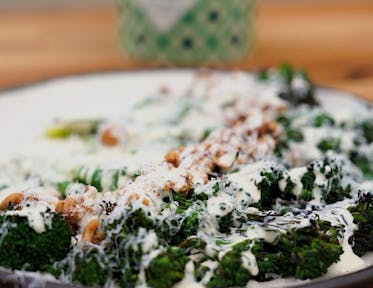 Purple Sprouting Broccoli with Anchovy Dressing, Hazelnuts, and Parmesan by Adam Byatt