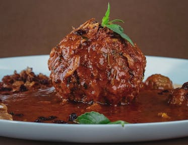 GRILLED GINGER-GARLIC CHICKEN MEATBALLS WITH AN ORANGE-SOY GLAZE