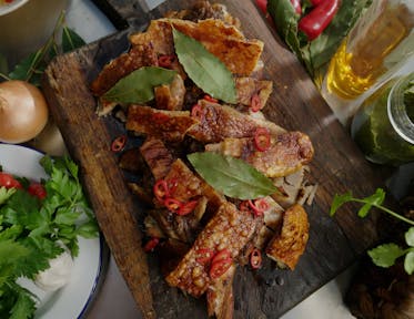 Green Seasoning & Rum Porchetta with Rum-dipped Crackling - by Andi Oliver