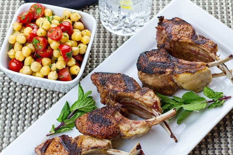 Lamb Chops with Harissa Rub and Tomato Garbanzo Salad Grilling
