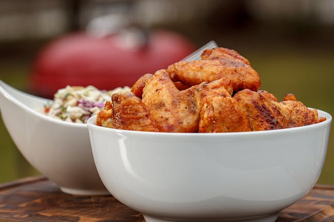 Buffalo Chicken Wings with Creamy Blue Cheese and Apple Slaw