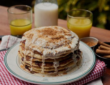 Cinnamon Swirl Pancakes with Cream Cheese Frosting Drizzle