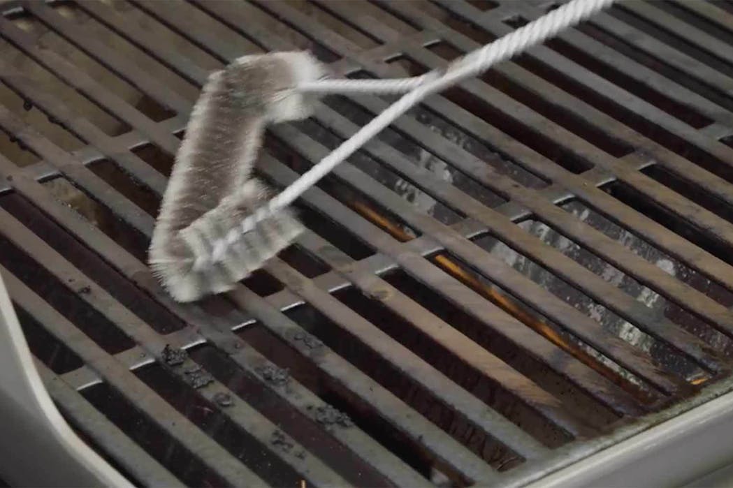 Cleaning With Grill Brush