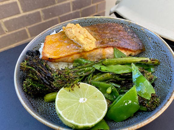 https://content-images.weber.com/content/crispy-salmon-with-laksa-butter-and-grilled-greens.jpg?auto=compress,format&w=742&h=434