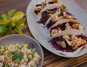 Spice-Crusted, Crispy Skin Salmon Tacos with Red Cabbage, Orange and Mint Slaw