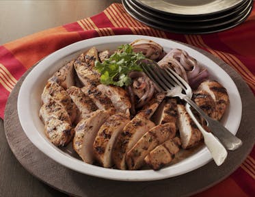 CITRUS-MARINATED CHICKEN BREASTS WITH GRILLED RED ONIONS