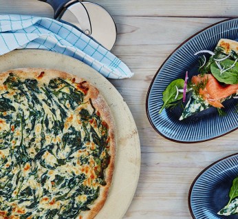 Pizza with smoked salmon and creamed spinach