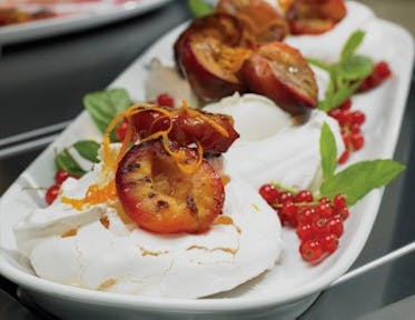 Chargrilled Peaches with Orange Syrup, Meringues and Whipped Cream