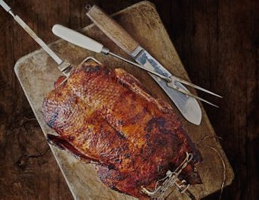 Roast Duck with Apple and Prune Stuffing