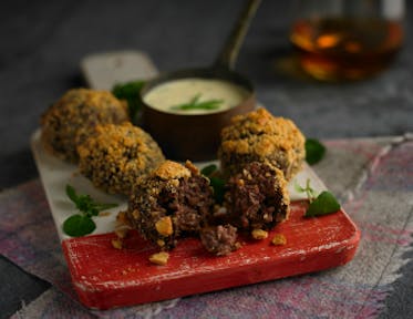 Haggis and Lamb Meatballs with an Oatcake Crumble and Whisky Cream Sauce